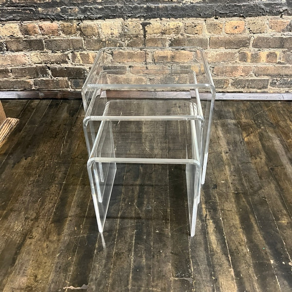 Lovely set of 3 waterfall style lucite nesting tables. They are in really good condition (some light scratches that would be expected with light use). Chicago, IL Studio Sonja Milan