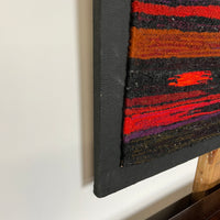 A large and colorful mid-century tapestry or kilim that has been mounted on  a canvas frame.  chicago, IL Studio Sonja Milan