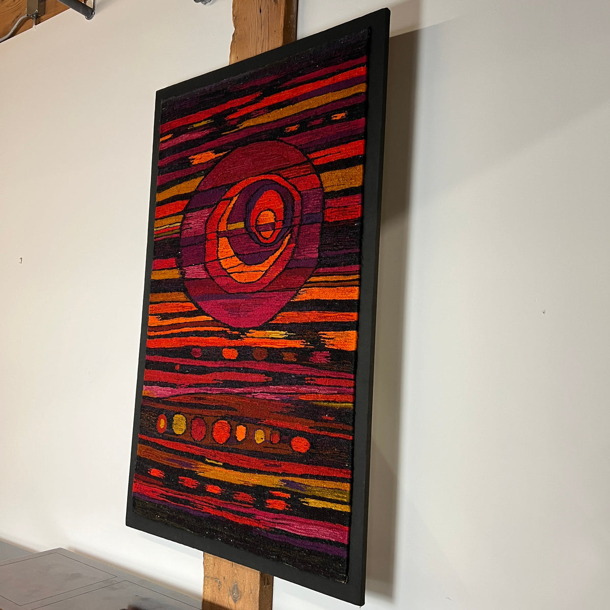 A large and colorful mid-century tapestry or kilim that has been mounted on  a canvas frame.  chicago, IL Studio Sonja Milan