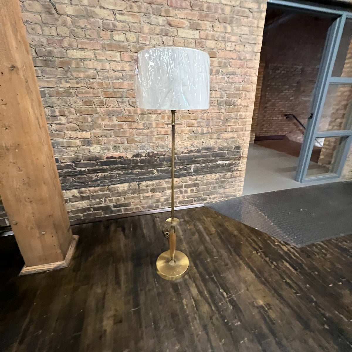 Mid-century brass and walnut floor lamp.  Studio Sonja Milan, Chicago, IL