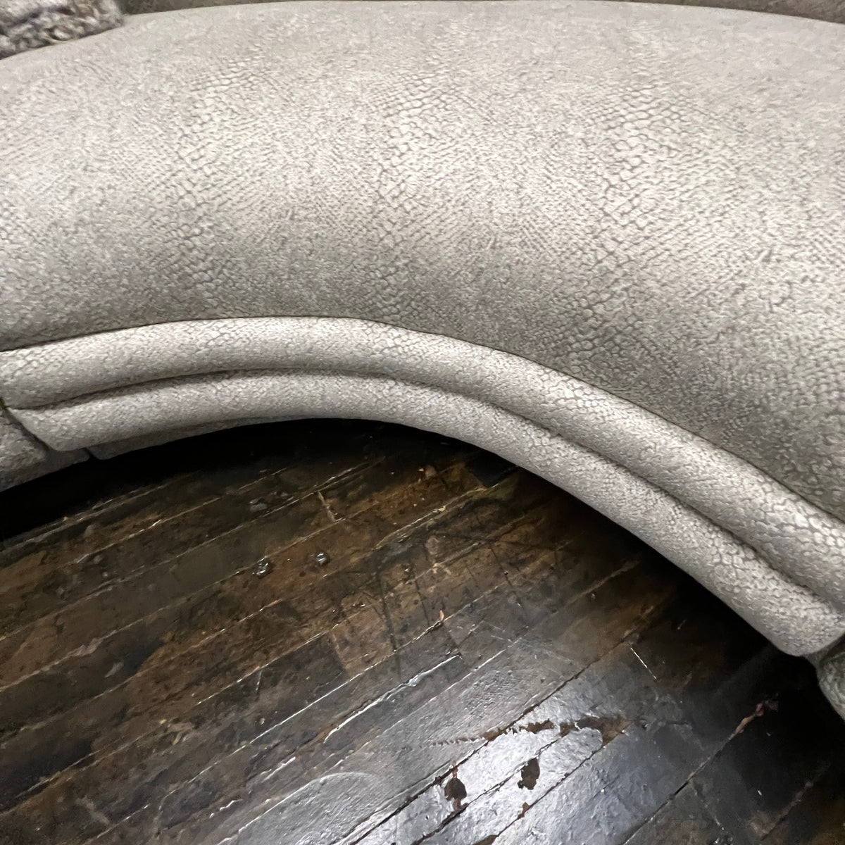 Mid-century curved sectional sofa attributed to Vladimir Kagan for Weiman Furniture. upholstered in a stunning neutral faux snakeskin fabric.